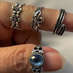 Silvertone black wash rings some with blue stone